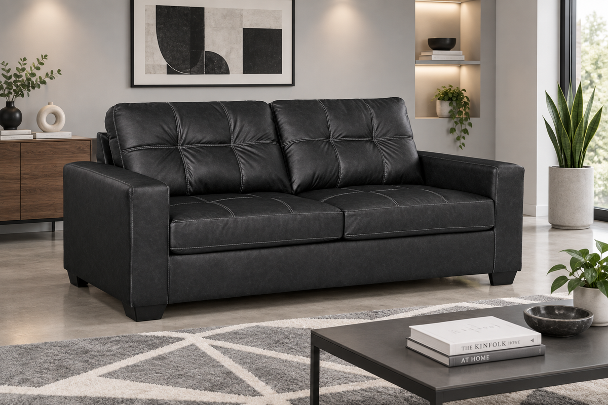Dark minimalist modern sofa with contrast stitching - lifestyle view